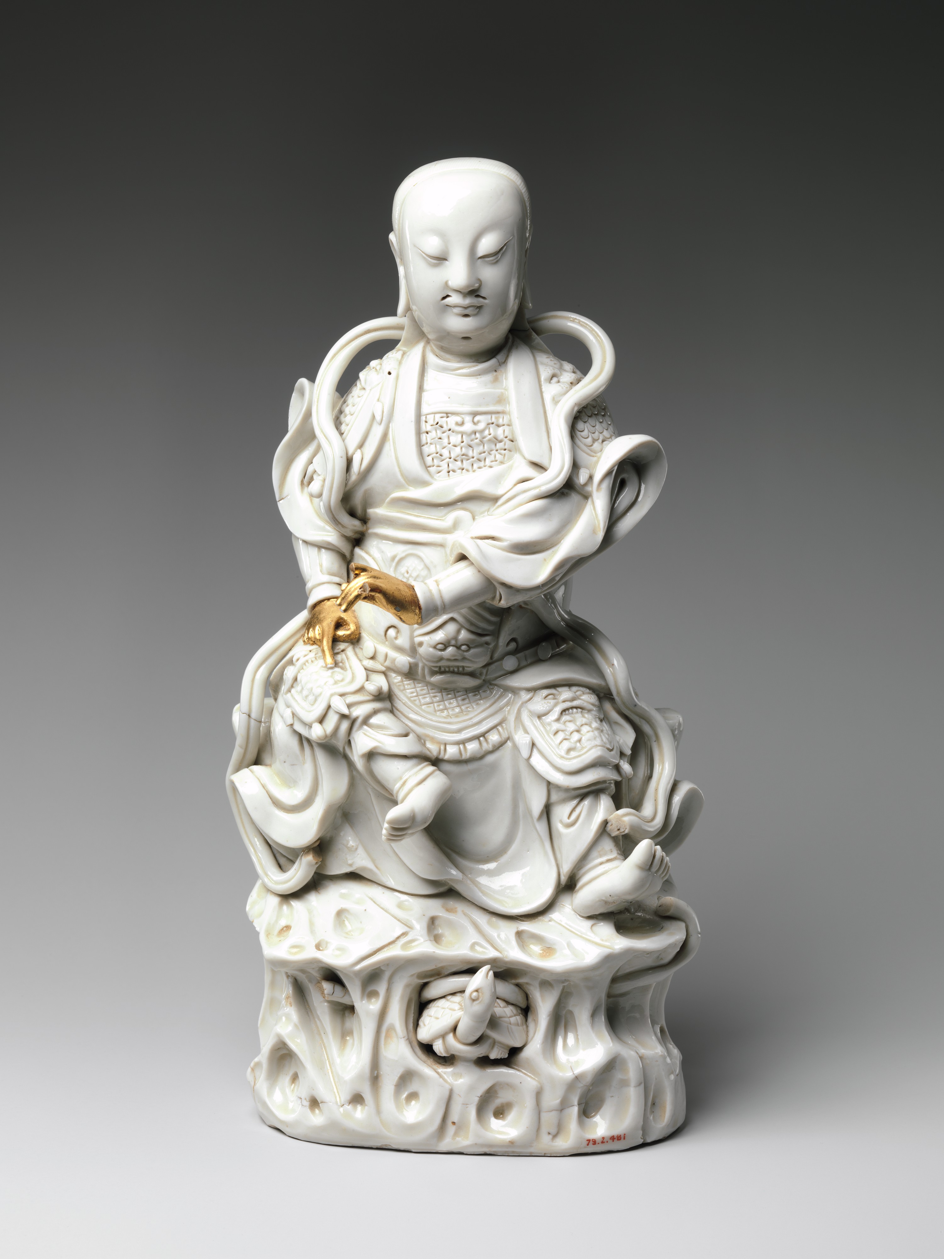 Dehua white porcelain figure of Zhenwu, early 18th century, The Metropolitan Museum of Art — religious figure representing Tier III in the auction pricing model, Blanc de Chine