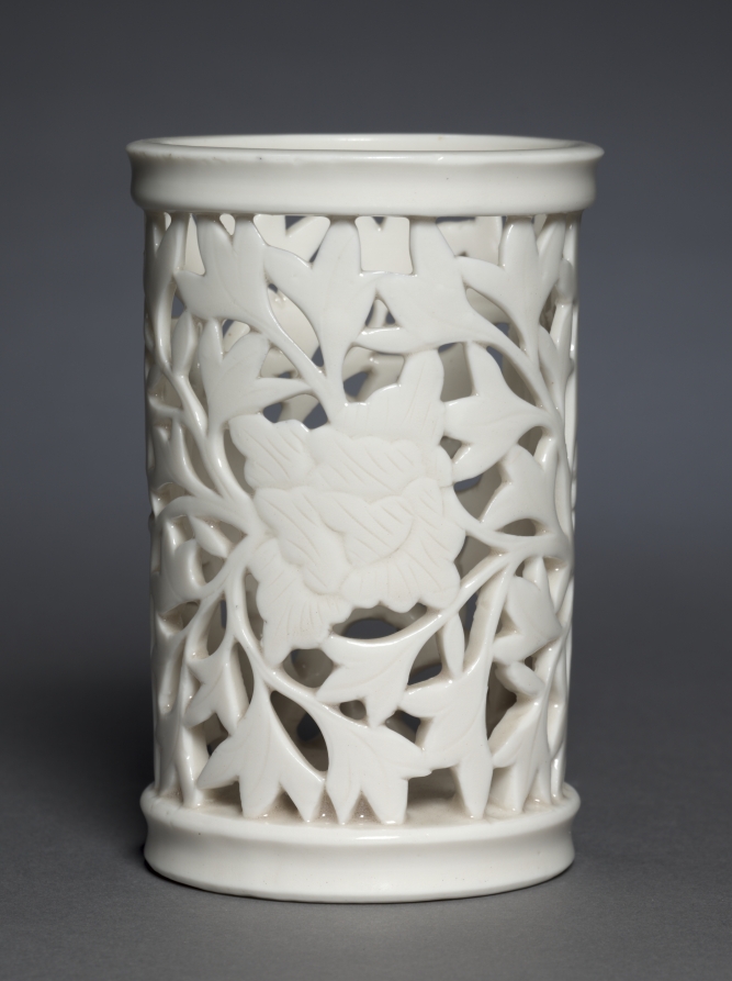 Brush Pot with Peonies: Dehua Ware, Glazed porcelain with pierced and incised decoration, Qing dynasty (1644–1911), H. 14.9 cm, Cleveland Museum of Art, 1964.180, Blanc de Chine
